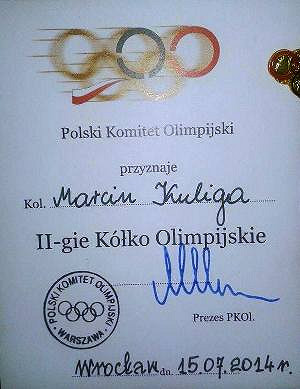 Marcin Kuliga z dwoma kółkami olimpijskimi - zdjęcie w treści 
