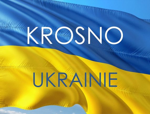 Napis KROSNO UKRAINIE na tle ukraińskiej flagi